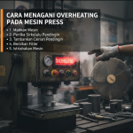 Teknisi memeriksa mesin press dengan alat pengukur suhu di pabrik industri.